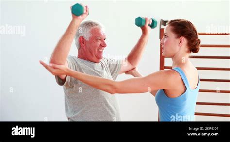 Older man lifting weights Stock Videos & Footage - HD and 4K Video ...