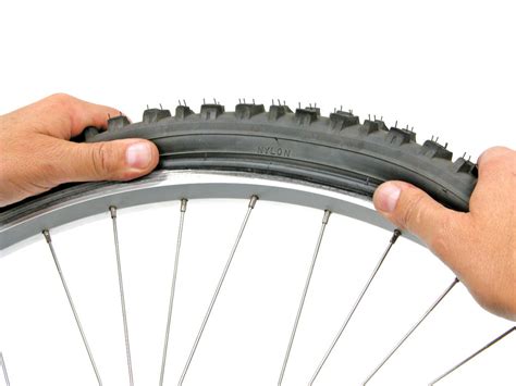 how to put on a bike tyre