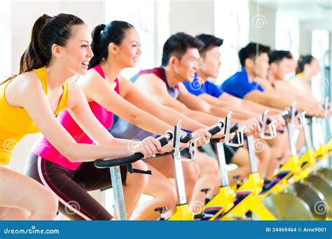 Asian People Spinning Bike Training at Fitness Gym Stock Photo - Image ...