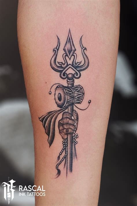 Trisha tattoo | Trishul tattoo designs, Creative tattoos, Arm band tattoo
