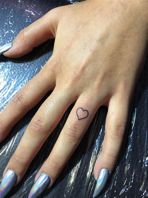 finger print tattoo heart