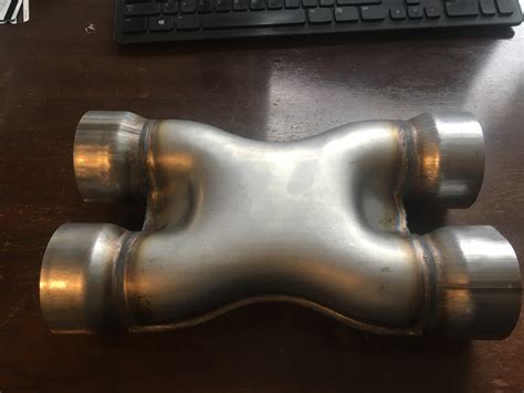It's a Jones Exhaust, universal X- pipe. It's used to quiet and smooth