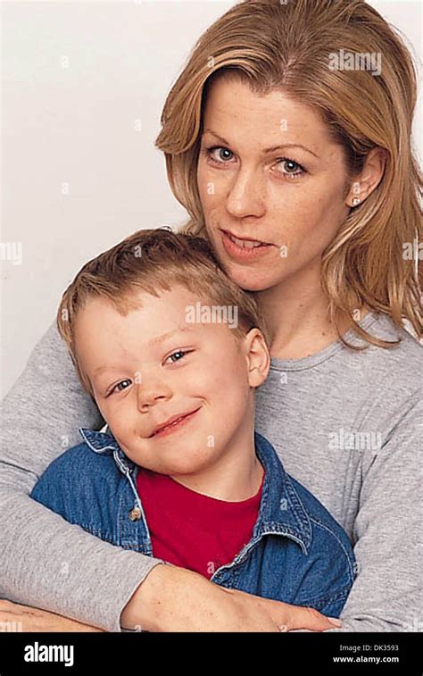 Mom and Son Hugging Stock Photo - Alamy
