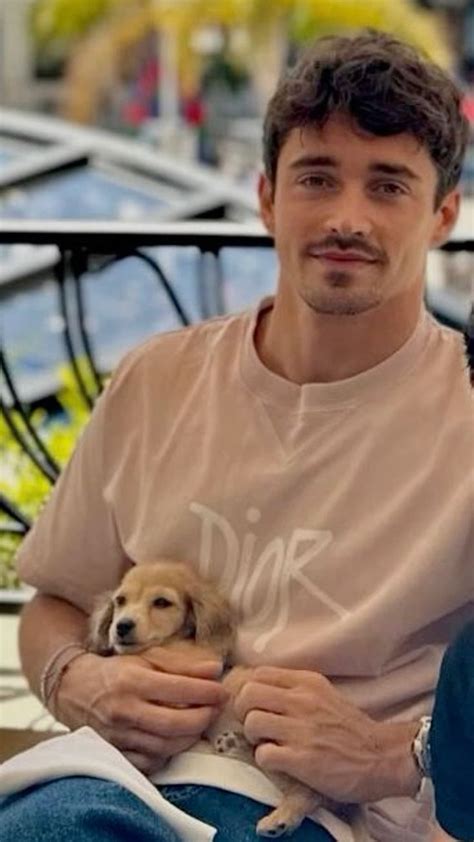 charles leclerc & leo 🤍 in 2024 | Puppies, Racing driver, Charles