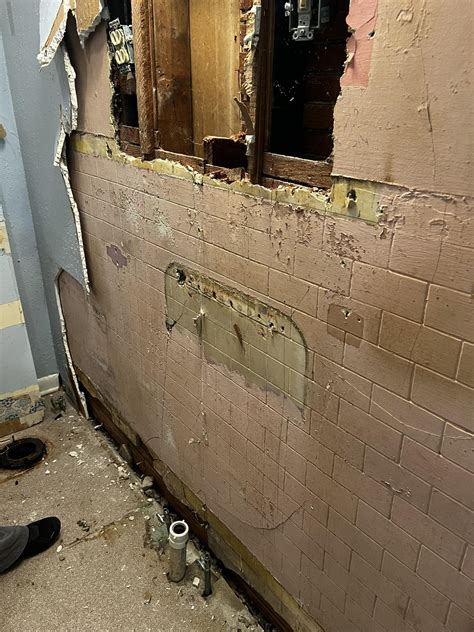 Our Old House | Tile pattern stamped horse hair plaster we found behind