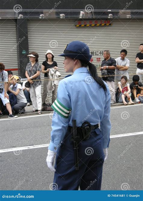 Police woman in Japan editorial photo. Image of blue - 74541681
