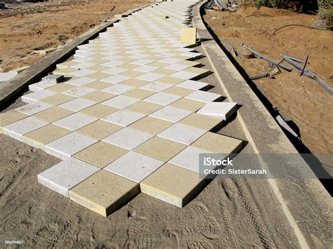 Laying Paving Slabs Stock Photo - Download Image Now - Abu Dhabi ...