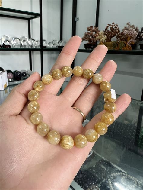 vong tay phong thuy thach anh toc vang