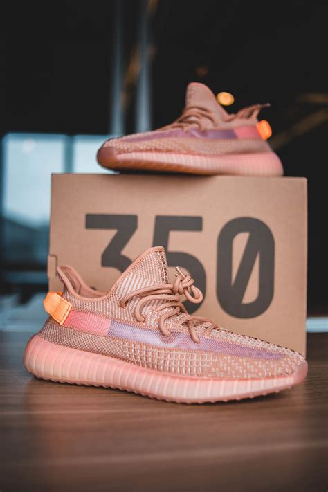 hd wallpaper unpaired orange adidas yeezy boost shoe apparel