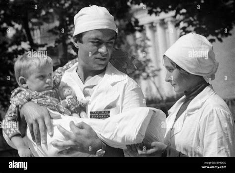 Micro surgeon Ramaz Datiashvili with his patient Rasa Prasceviciute ...