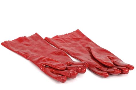 premium photo pair   red rubber gloves isolated  white background