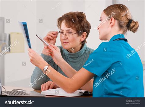 doctor patient discussing scan results diagnostic stock photo