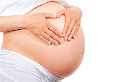 A woman with a fat belly in jeans, the concept of losing weight ...