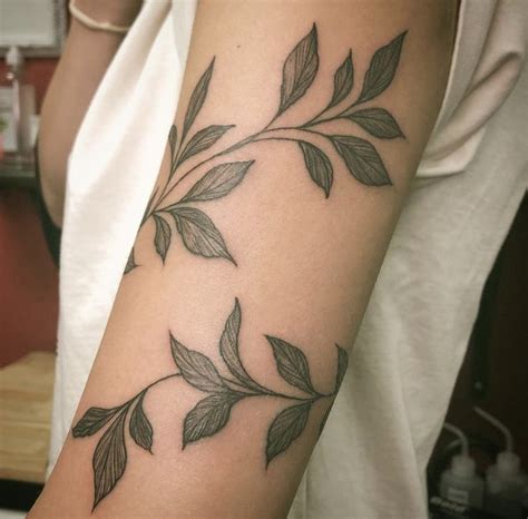 Vine tattoo | Vine tattoos, Green tattoos, Around arm tattoo