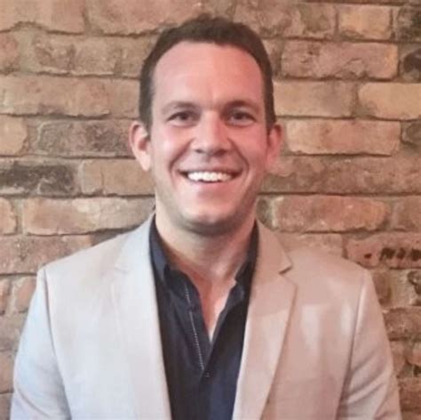 Melinda French Gates Holds Hands with Philip Vaughn