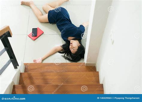 woman falling   stairs