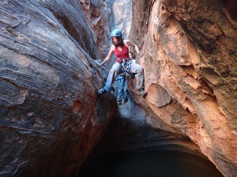 Christy trying to stay dry. - The Wives - Capitol Reef - Road Trip Ryan