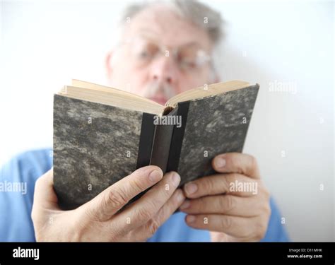 senior  reading   book stock photo alamy