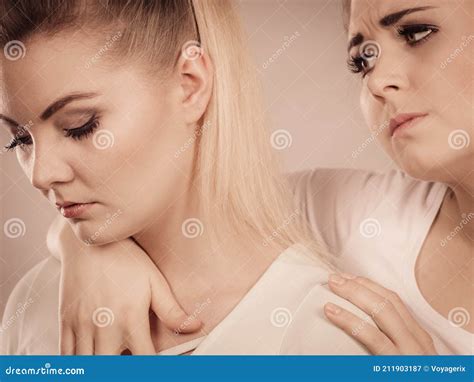 Woman Hugging Her Sad Female Friend Stock Image - Image of serious ...