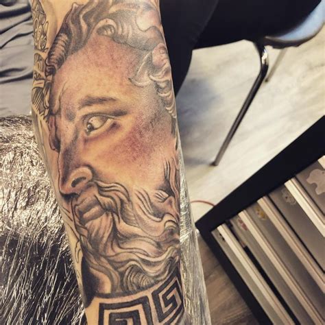 Let’s find out what symbolizes the ancient Greek god's tattoo designs ...