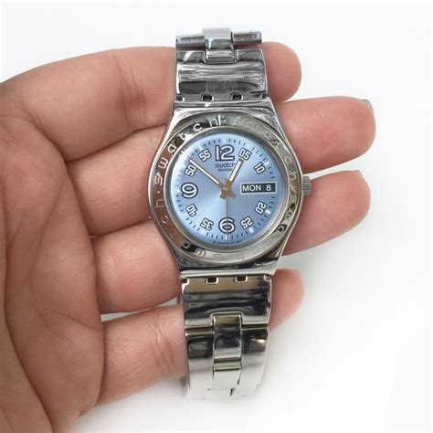 Sold Price: SWATCH: IRONY Stainless steel Day Date blue dial watch ...