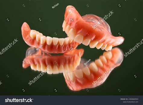 focus  maxillary mandibular complete dentures stock photo