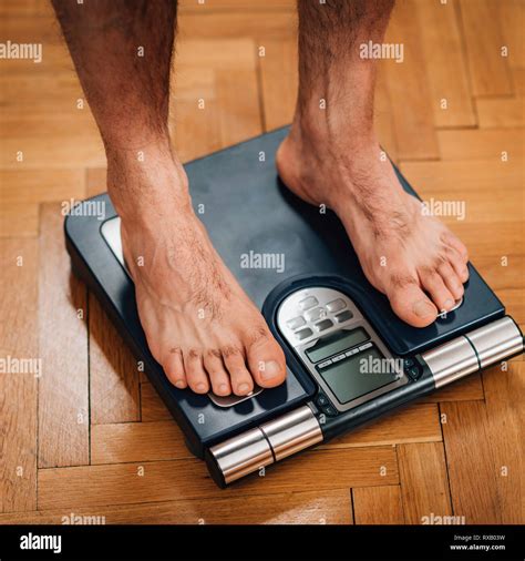 measuring body weight stock photo alamy