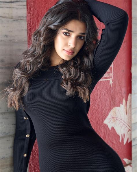 Krithi Shetty in short tight fit black dress sets temperature soaring