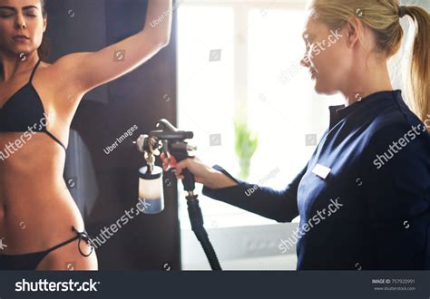 Beautician Using Aerograph Spraying Bodypaint Tan Stock Photo 757920991 ...