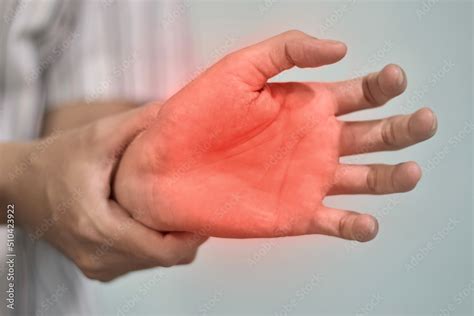 Painful palm of Asian man. Concept of compartment syndrome, cellulitis ...