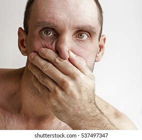 man holding  nose  white stock photo  shutterstock