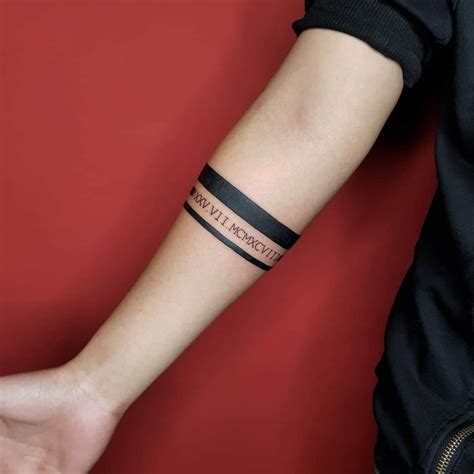 arm band tattoo meaning commitment strength continuity