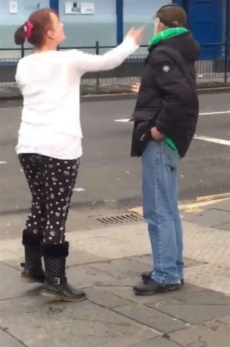 Woman viciously slaps and punches man during Glasgow street bust-up in