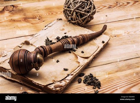 smoking tobacco,a glass of whiskey in vintage style Stock Photo - Alamy