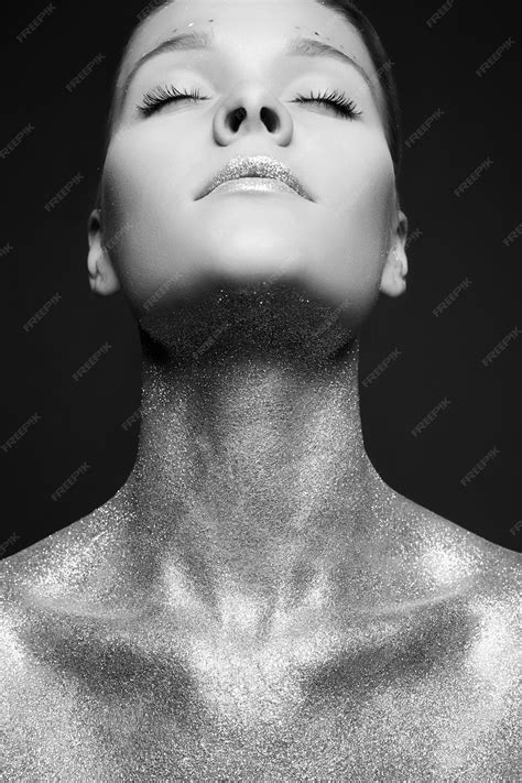 Premium Photo | Beautiful Woman with Sparkles on Body and lips
