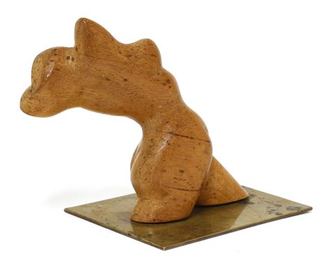 Lot 324 - A Hagenauer bronze and carved wood nude form,