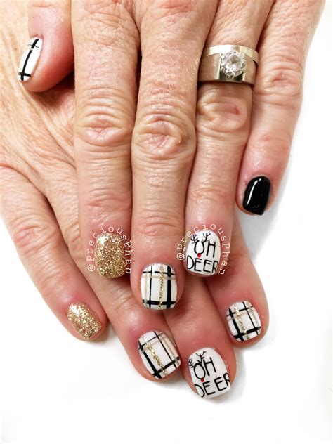 Reindeer nails. Plaid nails. Christmas nails. #PreciousPhan | Plaid