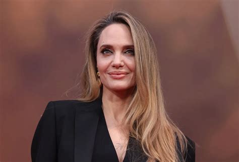 Angelina Jolie's Journey: The Truth About Her Adopted Children Revealed - Hunter Games Magazine