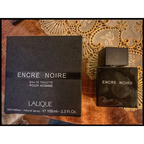 Lalique Encre Noire - купить мужские духи, цены от 290 р. за 2 мл