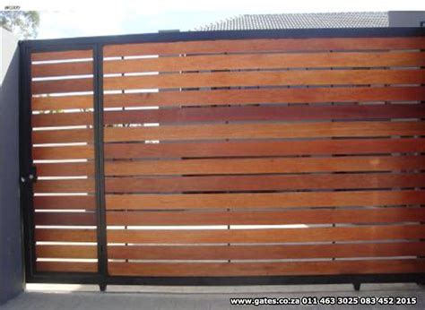 Wooden driveway gates | House gate design, Wooden gates driveway, House ...