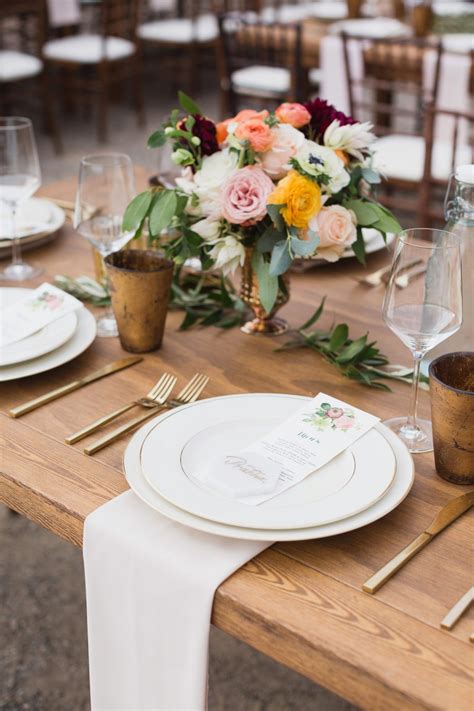 wedding reception napkin folds triangular fold beneath marbled plate