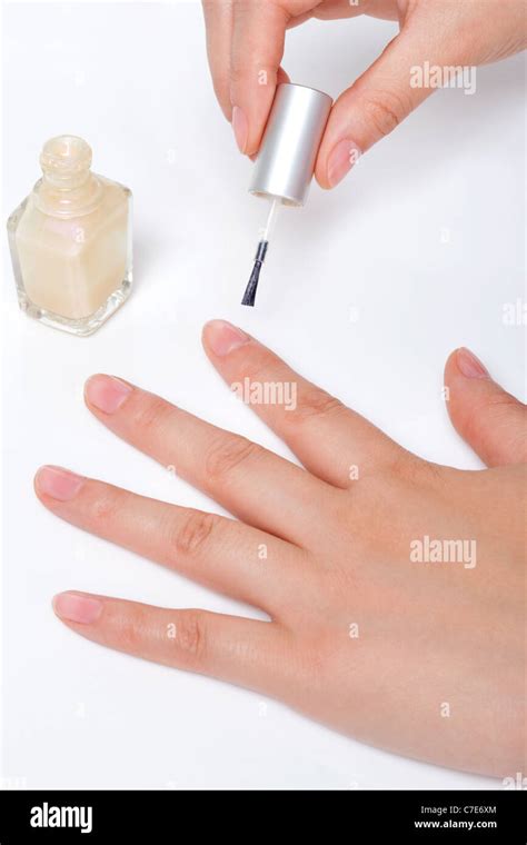 Woman Painting Fingernails Stock Photo - Alamy