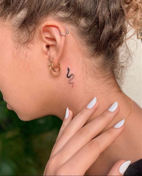 Mini snake tattoo | Neck tattoo, Tattoos, Small snake tattoo