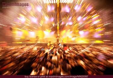 Rock Band Performing on a Stage Lit with Bright Lights. Stock Photo ...