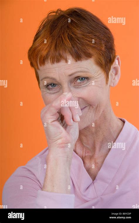 older woman making fun Stock Photo - Alamy