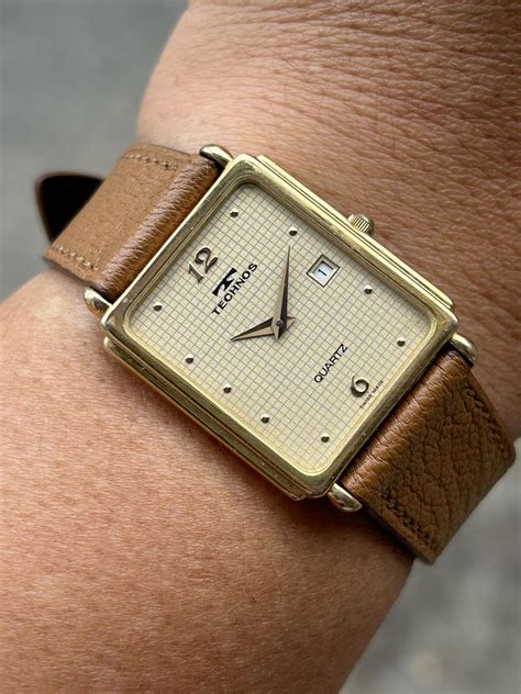 technos tank quartz vintage   stainless steel  swiss