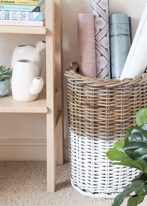 These stylish rattan baskets are made from a mixture of grey and buff