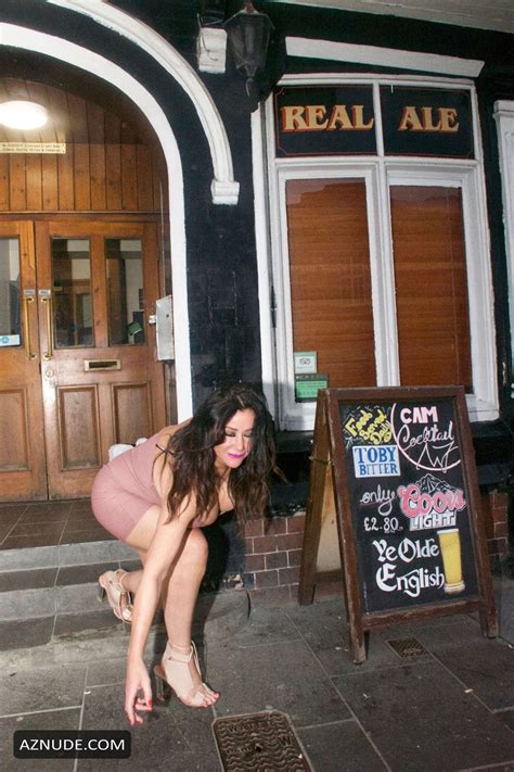 Lisa Appleton seen stumbling out of pub before an embarrassing nip slip