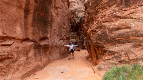 Traveler in Fiery Furnace Hiking Trail in Utah Stock Photo - Image of stone, wall: 302151562