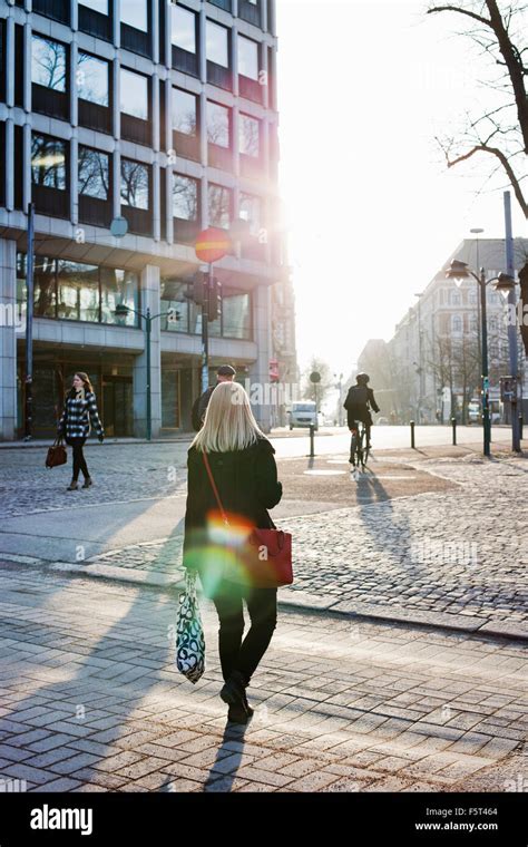 Walking across street hi-res stock photography and images - Alamy